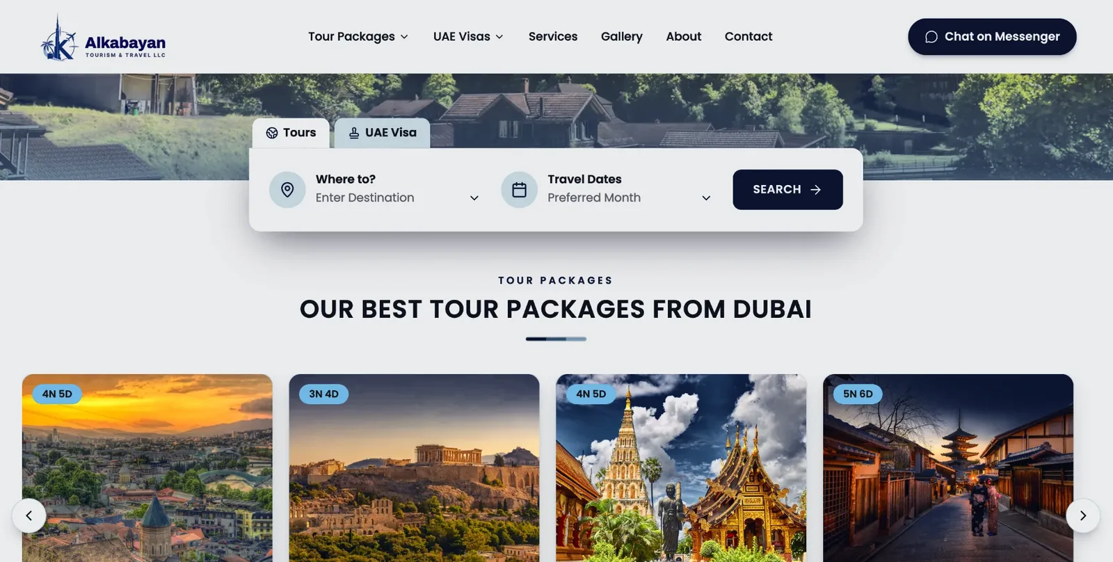 Alkabayan Tourism website homepage with a tour and visa search bar and tour package cards